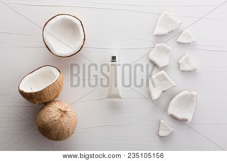 Homemade Coconut Products On White Wooden Table Background From Top View. Good For Space And Backgro