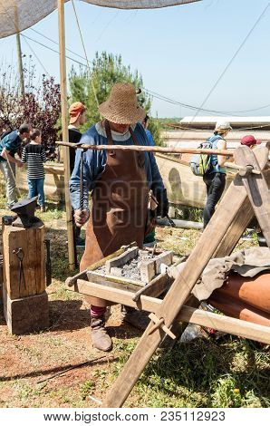Goren, Israel, April 06, 2018 : Blacksmith - Participant In Knight Festival Shows His Skill In Goren