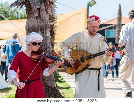 Goren, Israel, April 06, 2018 : Musicians Play Musical Instruments For Guests Of Knight Festival In 