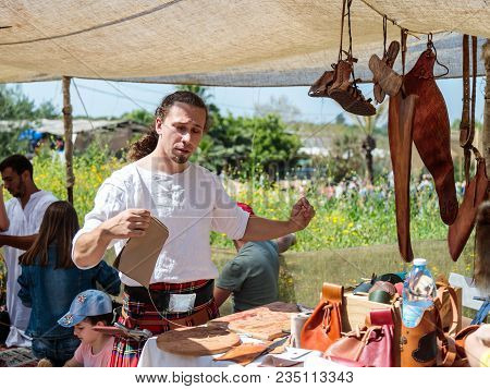 Goren, Israel, April 06, 2018 : The Tanner Shows Visitors Of The Knight Festival How To Sew A Purse 