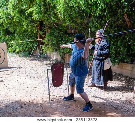 Goren, Israel, April 06, 2018 : Visitor Of The Knight Festival Learns To Throw A Spear At The Target