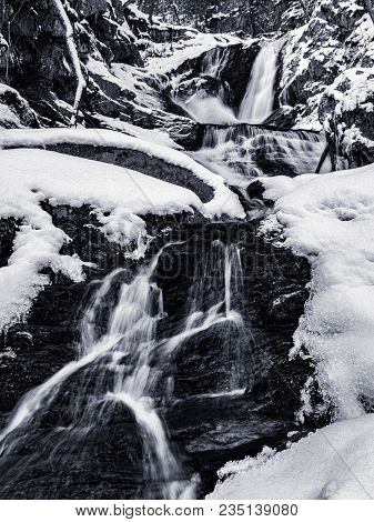 Winter Time Hiking To The Sanderson Brook Falls In Chester Ma.  Snow And Ice Cover The Landscape In 