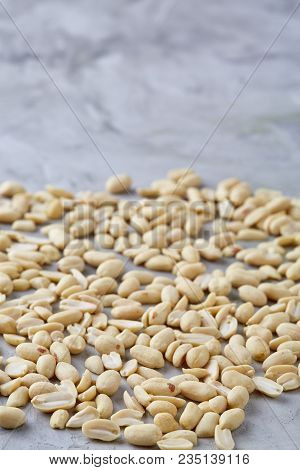 Pile Of Peelled Peanuts Isolated On White Textured Background, Background, Top View, Close-up, Selec