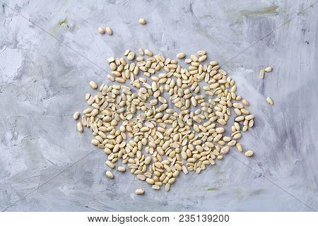 Pile Of Peelled Peanuts Isolated On White Textured Background, Background, Top View, Close-up, Selec