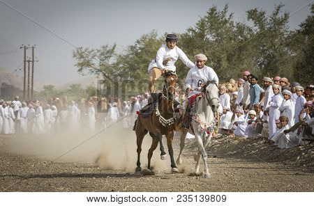 Ibri, Oman, April 7th, 2018: Omani Men On Horses In A Countryside Of Oman