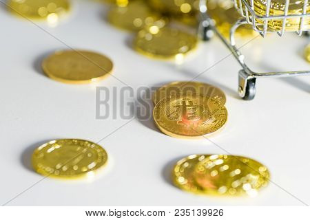 Scattered Coins. Cart Near Bitcons. Coin On A Coin