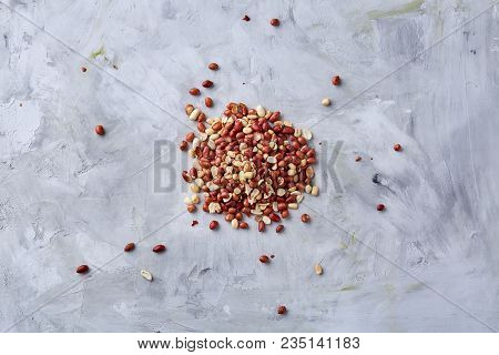 Pile Of Mixed Raw Peelled Peanuts Isolated On White Textured Background, Background, Top View, Close