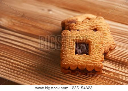 Chocolate Cookies On Gray Plate On Wooden Table