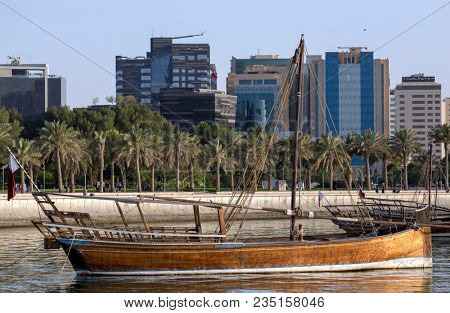DOHA, QATAR - April 7, 2018: A type of dhow known as a jalibut anchored in the Museum lagoon in Doha.