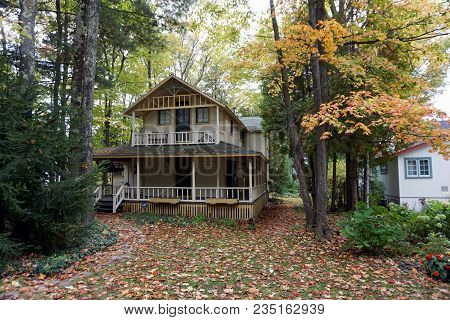 Bay View, Michigan / United States - October 16, 2017:  A Two Story Victorian Cottage, With A Balcon