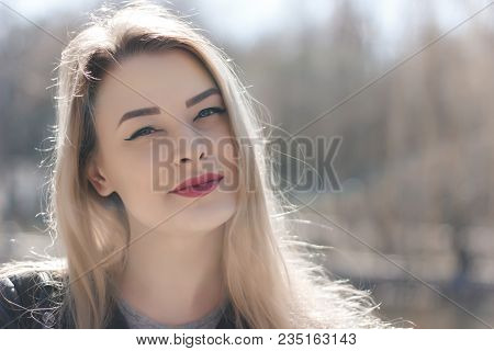 Outdoors Portrait Of Beautiful Young Brunette Girl. Woman Smiling Happy On Sunny Summer Or Spring Da