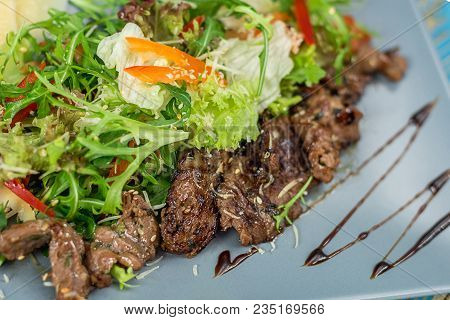Vegetable Vegetarian Salad In A Gray Plate With Meat