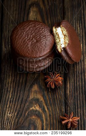 Three Choco Pie Sweet Dessert On The Village Dark Old Table In Moodle Style