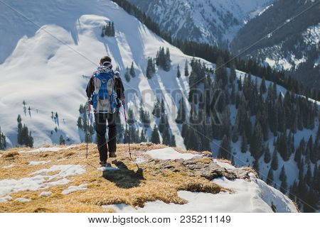 Austria, Alps, May, 2016: The Father With Small Child On The Mountains Meadow With Great View.