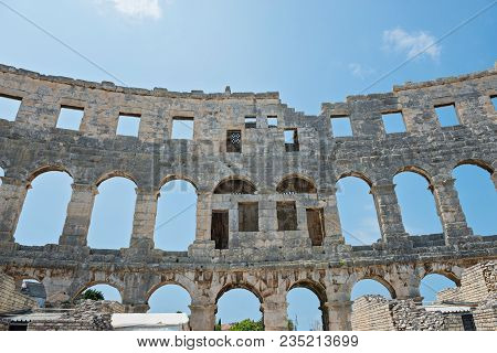 Pula, Croatia - August 4, 2016: Walls And Windows Of The Pula Arena The Amphitheatre Located In Pula