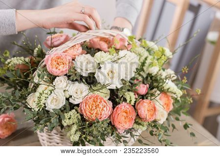 Close-up Hands Female Florist. Floral Workshop - Woman Making A Beautiful Flower Composition A Bouqu