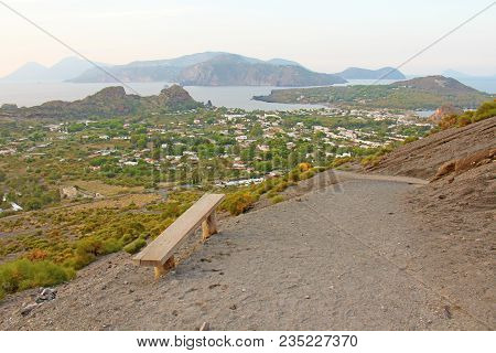 Wooden Bench With View On The Sea And Mountains. Lipari, Italy.