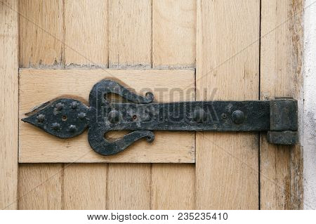 Decorative Metal Hinge Of A Medieval Gate In Russia