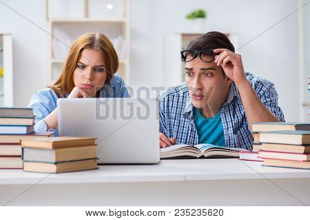 Two students preparing to school exams