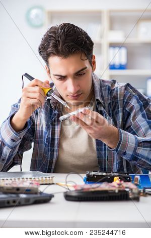 Computer hardware repair and fixing concept by experienced techn