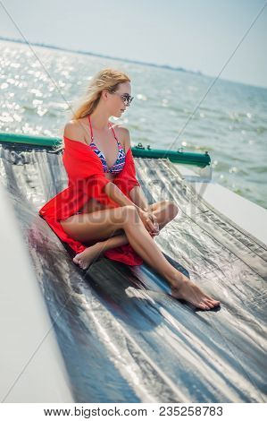 Beautiful Bikini Girl In Open Water Sea On Yacht