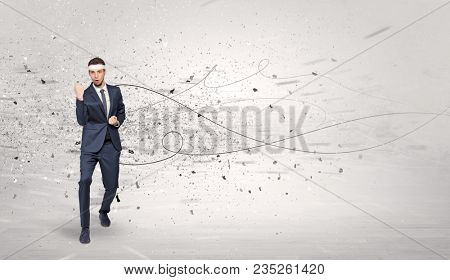 Young suited karate trainer doing karate tricks with chaotic concept