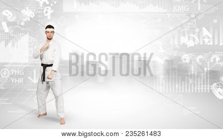 Young karate trainer doing karate tricks on the top of a metropolitan city