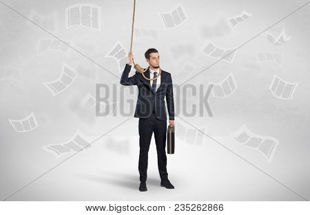 Young burnout businessman with flying documents concept