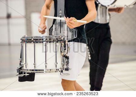 Details From A Music, Show And Marching Band. Playing Musicians With Percussion Instruments During A