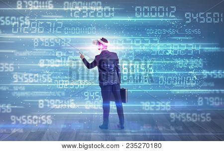 Businessman in vr glasses with variable fast changing numbers around