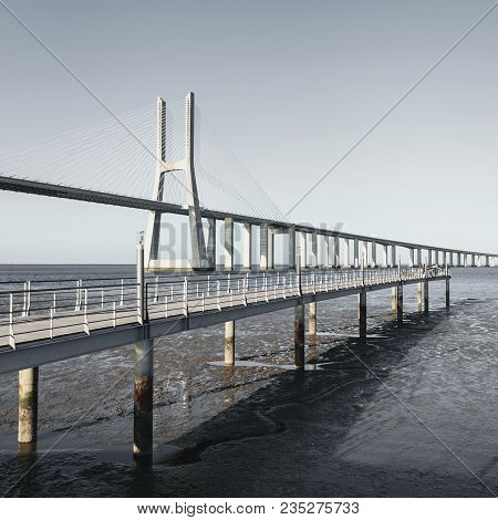 Vasco Da Gama Bridge In Lisbon, Portugal. Photo Afternoon On A Sunny Day
