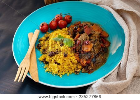 Kefta Tagine Moroccan Meatballs Served With Semolina and Vegetables 