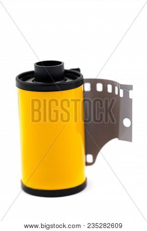 Expired 35mm Film Against An Isolated White Background In Studio.