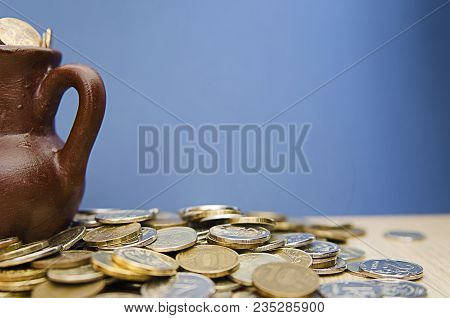 Ancient Jug With Coins. Old Coins In A Pot. Savings