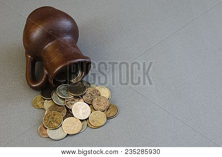 Ancient Jug With Coins. Old Coins In A Pot. Savings