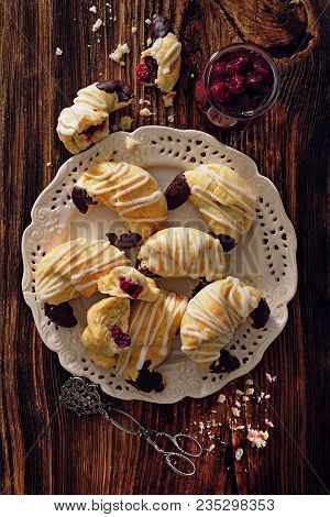 Cherry Filled Crescent Rolls Decorated With Dark Chocolate