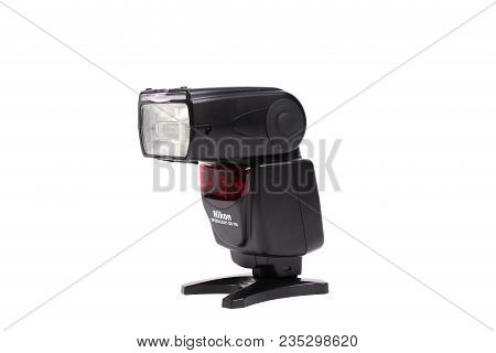 Kyiv, Ukraine - February 28, 2015: Photo Camera Flash Nikon Speedlight Sb-700 On White Background
