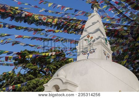 Small Buddhist Stupa With Prayer Flags At Swayambunath Temple In Kathmandu, Nepal.