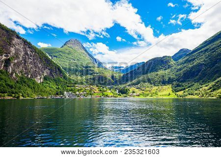 Geiranger Is A Small Tourist Village In Sunnmore Region Of Norway. Geiranger Lies At The Geirangerfj