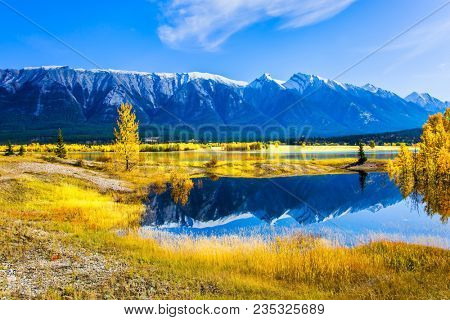 Abraham Lake is the most beautiful lake in the Rockies of Canada. Dense forests cover the lake shores. The concept of ecological and active tourism