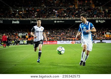 VALENCIA, SPAIN - APRIL 8: (L) carlos Soler during Spanish La Liga match between Valencia CF and RCD Espanyol at Mestalla Stadium on April 8, 2018 in Valencia, Spain