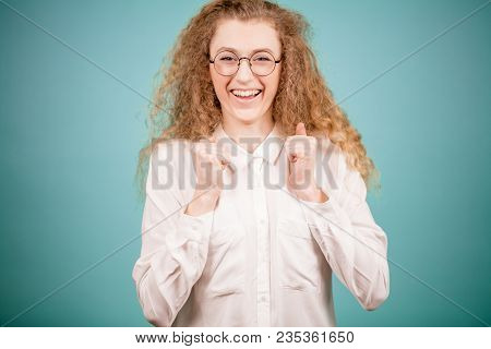 Young Teacher Is Gigling Nervousely.heartly Chuckle. Grim Laughter. Robustious Laughter.