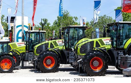 Novi Sad, Serbia: May 9. 2015 - Novi Sad Agro Fair With People And Fair Show. Modern Tractors And Ha