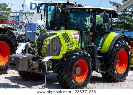 Novi Sad, Serbia: May 9. 2015 - Novi Sad Agro Fair With People And Fair Show. Modern Tractors And Ha