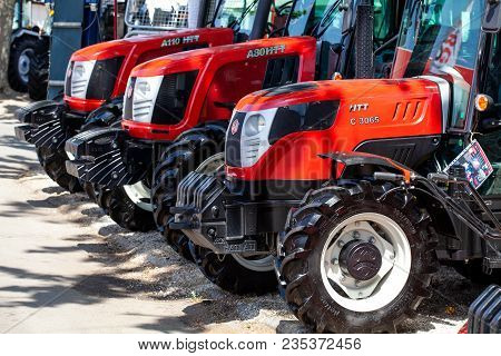 Novi Sad, Serbia: May 9. 2015 - Novi Sad Agro Fair With People And Fair Show. Modern Tractors And Ha