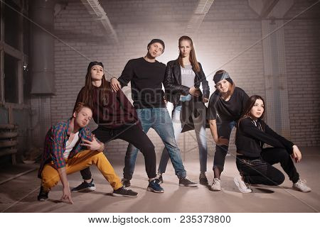 Cool Caucasian Teenagers Have Gathered In Garage.arrogant, Impudent Generation