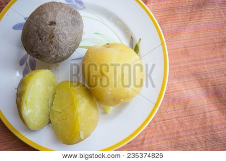Boiled Potato Whithout Peel Approached To One With The Peel