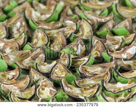 Green Walnuts, Sliced And Dried In The Sun For Preparation Italian Nochino Liqueur