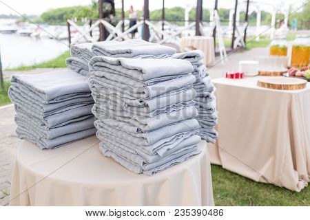 Gray Plaids For Bad Weather. Summer Time. Outdoor. Warm Blankets On An Open Air Wedding Ceremony