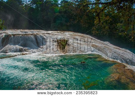 Turquoise-blue Water Of The Waterfall Agua Azul In Chiapas, Palenque, Mexico. Beautiful Scenery And 